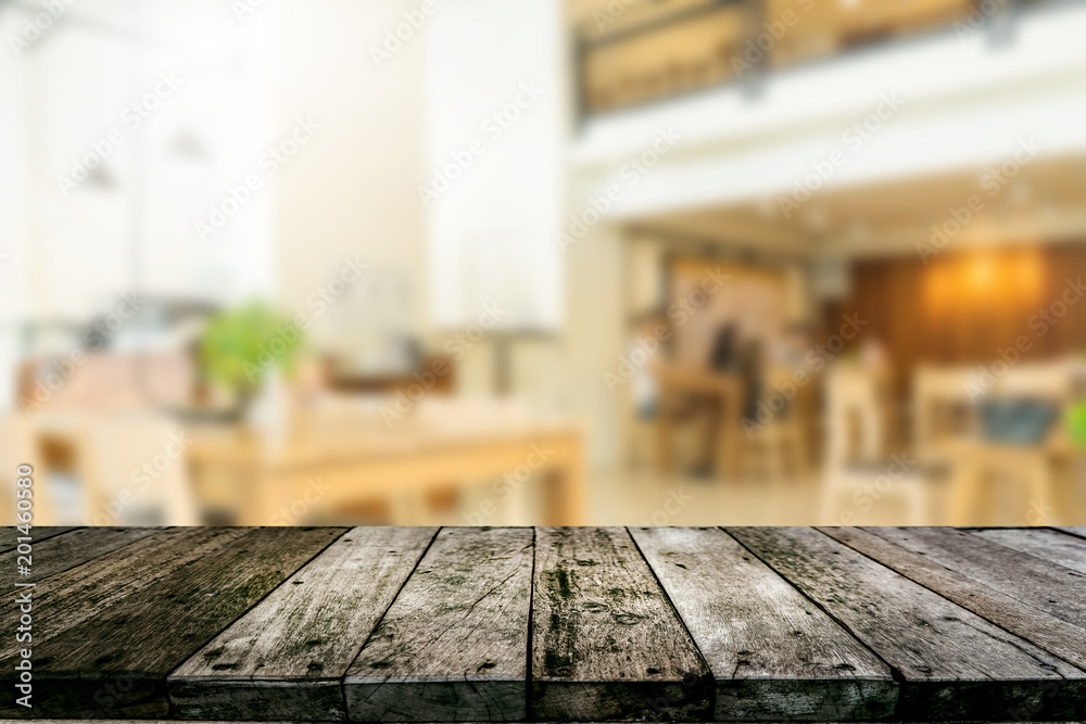 Wood shelf with coffee shop blurred background