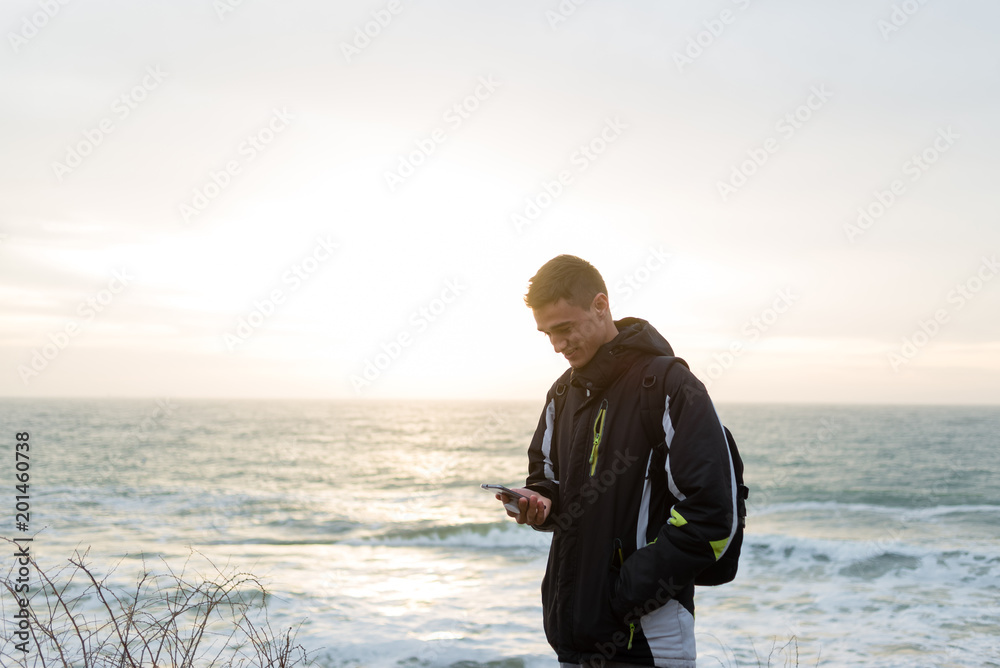the guy saw something in the phone and smiled sweetly the guy saw something in the phone and smiled sweetly
