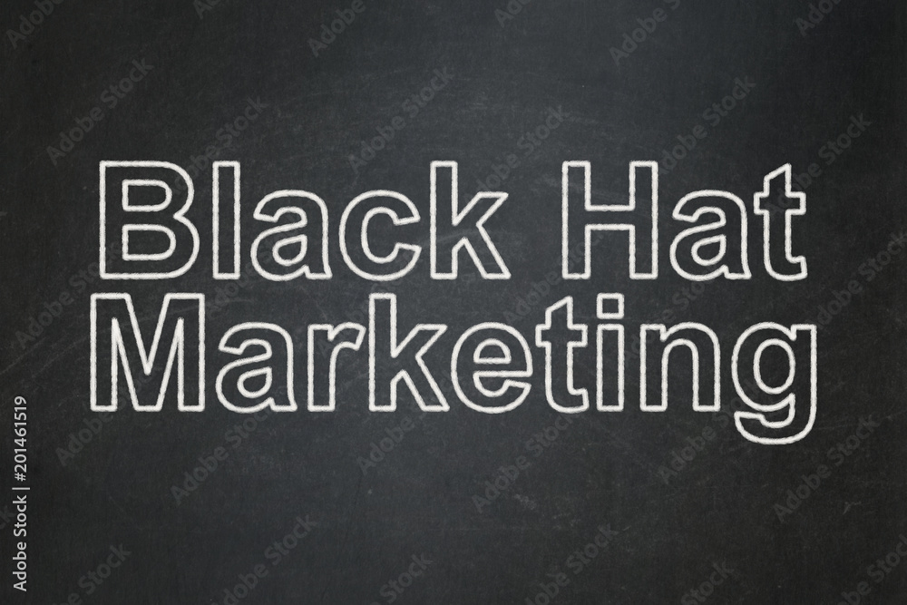Marketing concept: text Black Hat Marketing on Black chalkboard background Marketing concept: text Black Hat Marketing on Black chalkboard background