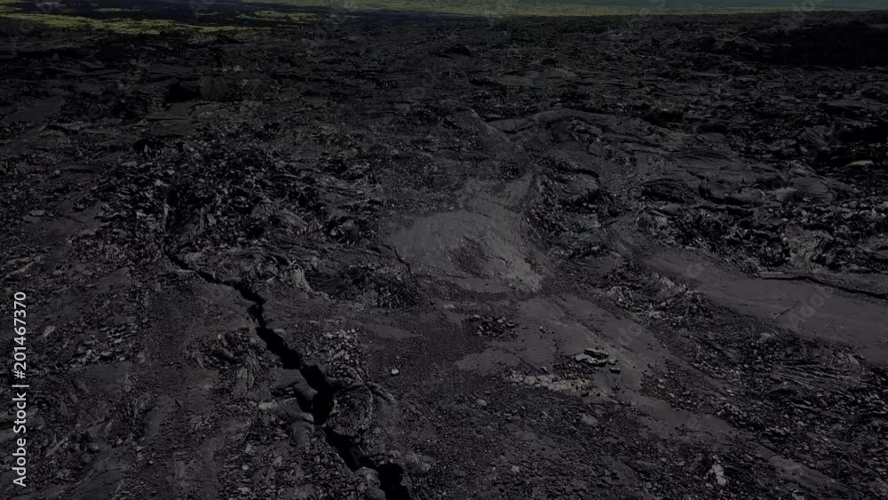 Flying over frozen lava of Big Island of Hawaii, USA Flying over frozen lava of Big Island of Hawaii, USA