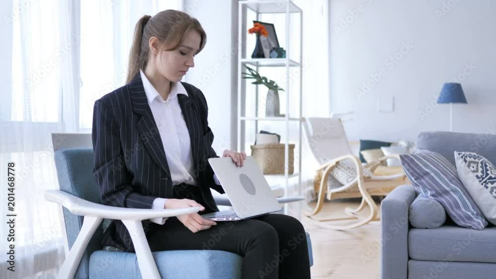 Woman Leaving Office after Completing Work on Laptop Woman Leaving Office after Completing Work on Laptop