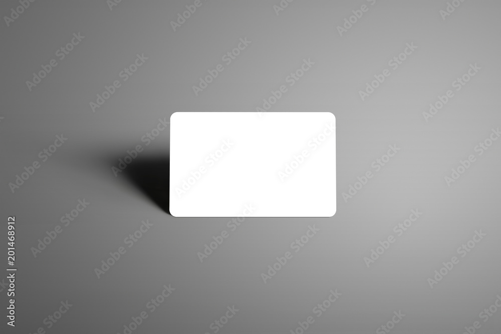 Blank mockup one bank (gift) card on a studio gray background. Blank mockup one bank (gift) card on a studio gray background.
