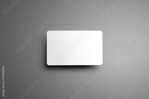 Universal blank mockup  one bank (gift) card with shadows on a gray background. photo