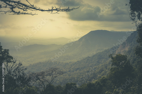 Canvas Print Mountainous terrain and cloudy sky