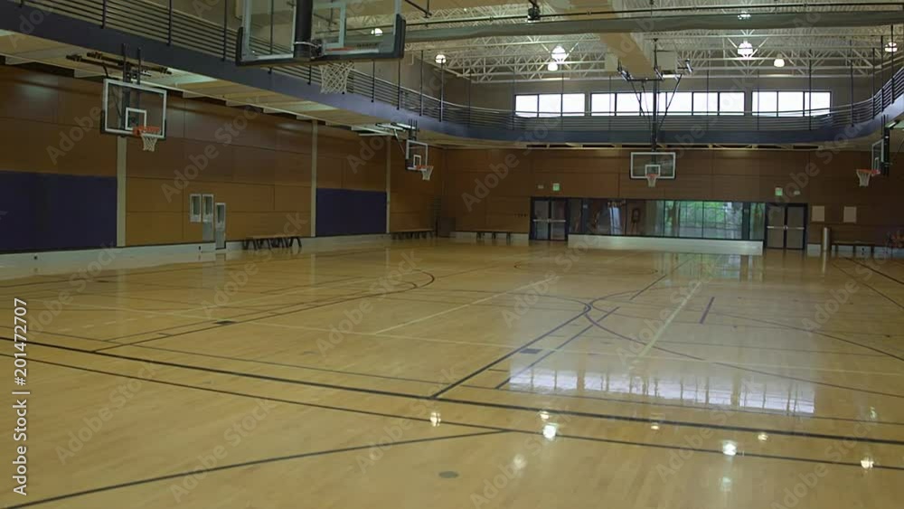 An empty basketball court during daytime