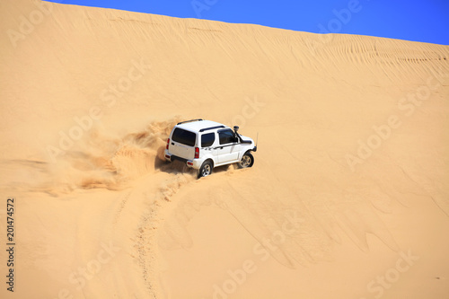 Off-road vehicle traveling in the desert