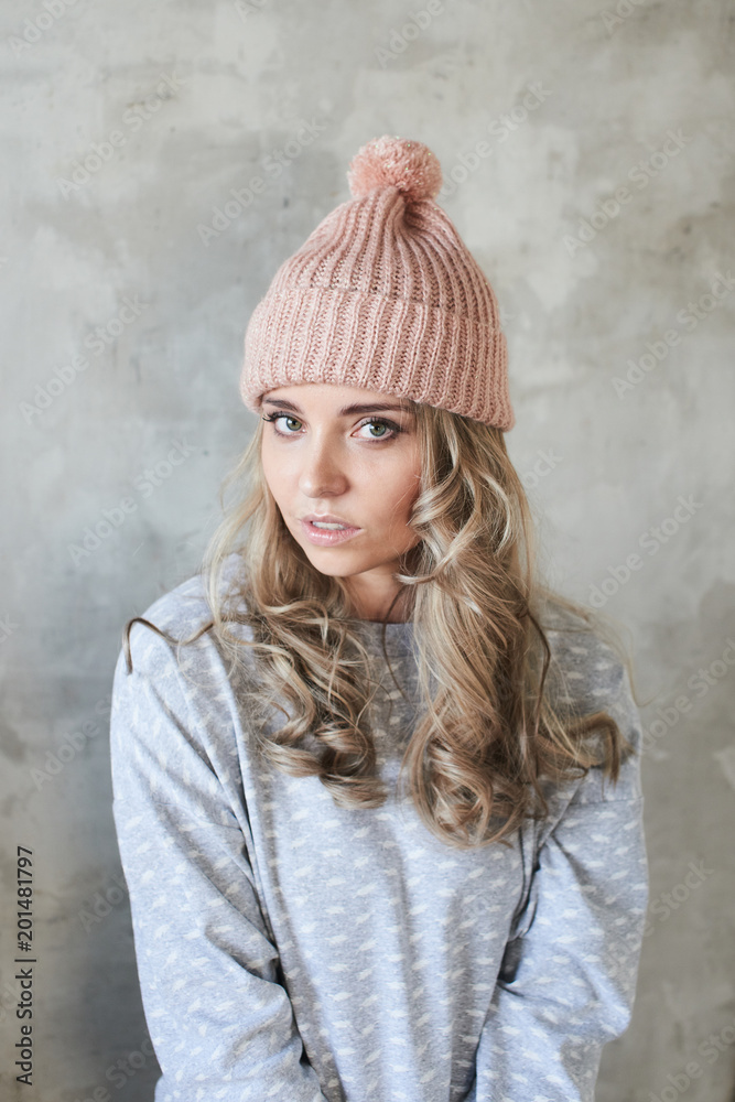 lookbook. Stylish girl on grey wall background lookbook. Stylish girl on grey wall background