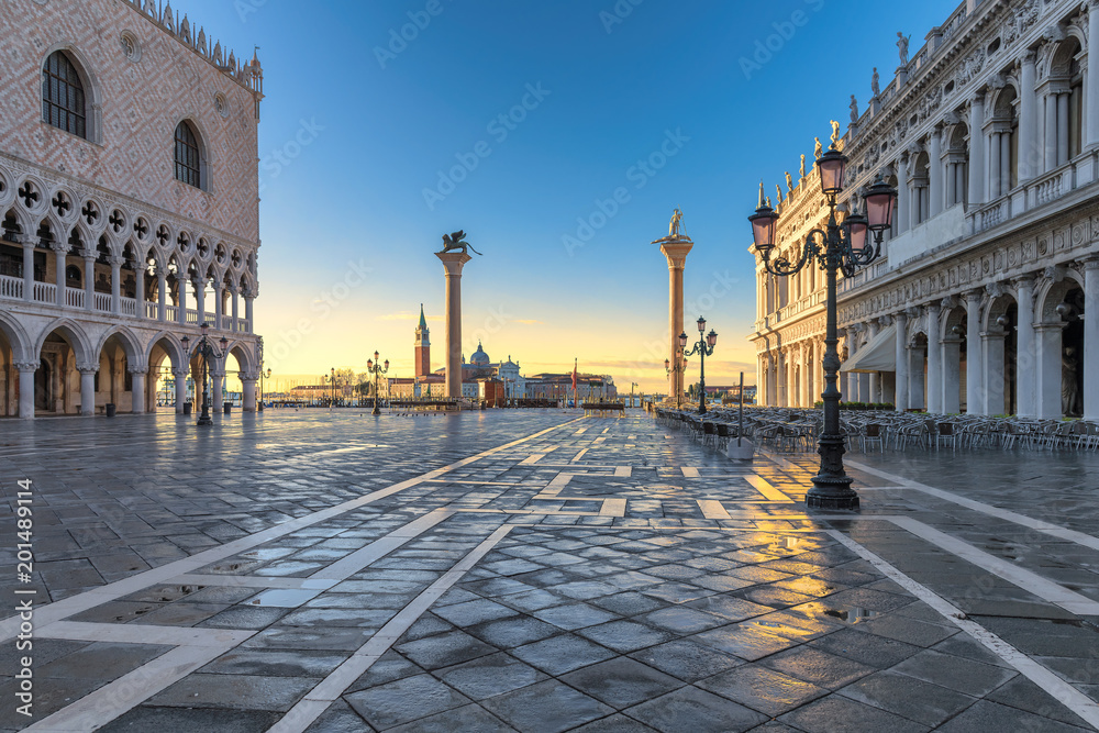 Venice sunrise, San Marco square and famous Doge palace in in Venice, Italy.