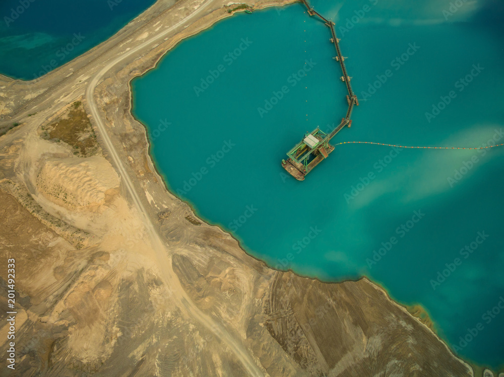 aerial view of dredge replenish sand in blue lake