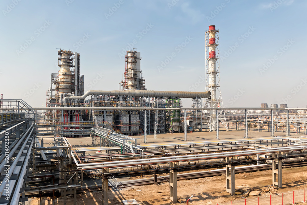 View of the new columns and chemical apparatus plant for oil refining at refinery View of the new columns and chemical apparatus plant for oil refining at refinery