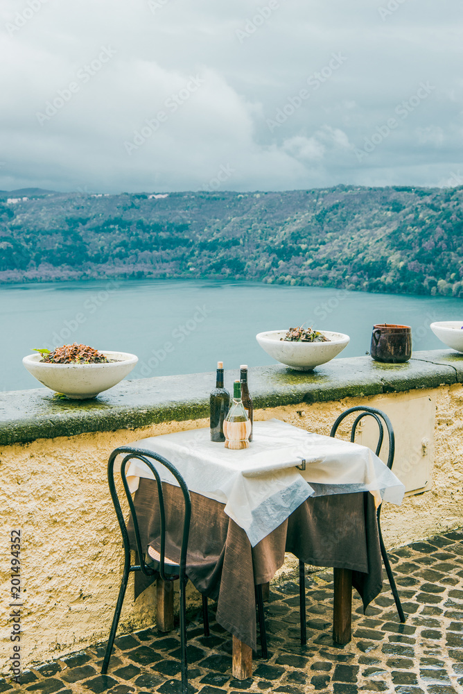 drinks on cafe table with view on lake albano in Castel Gandolfo, Rome suburb, Italy