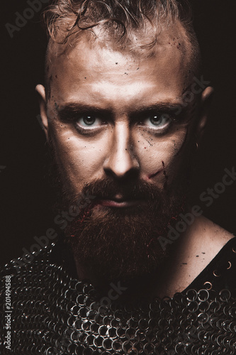 Viking with blue eyes in studio