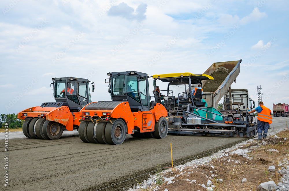 Road construction, asphalt concrete paving Road construction, asphalt concrete paving