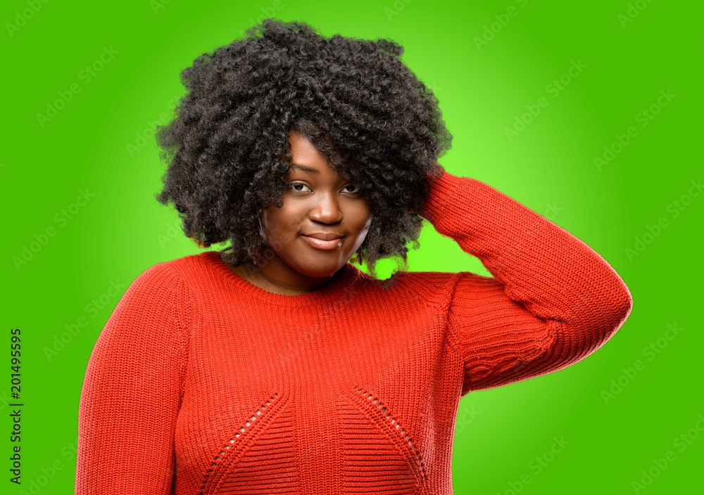 Beautiful african woman confident and happy with a big natural smile laughing Beautiful african woman confident and happy with a big natural smile laughing