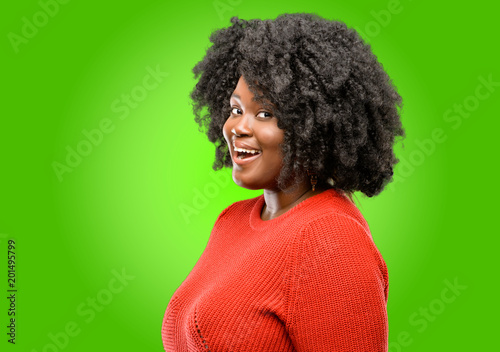 Beautiful african woman confident and happy with a big crazy smile laughing © Krakenimages.com