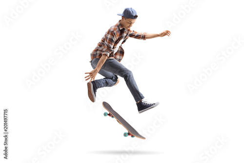 Teenage skater performing a trick with a skateboard