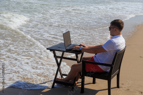 Wallpaper Mural Business Man Working on Tropical Beach Torontodigital.ca