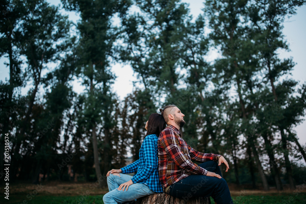 Walk a guy and a girl. Love story in the forest. Youth in nature. Walk a guy and a girl. Love story in the forest. Youth in nature.