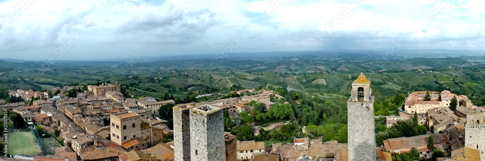Panoramic view of medieval towers and terracotta rooftops in iconic San Gimignano, Tuscany, Italy
