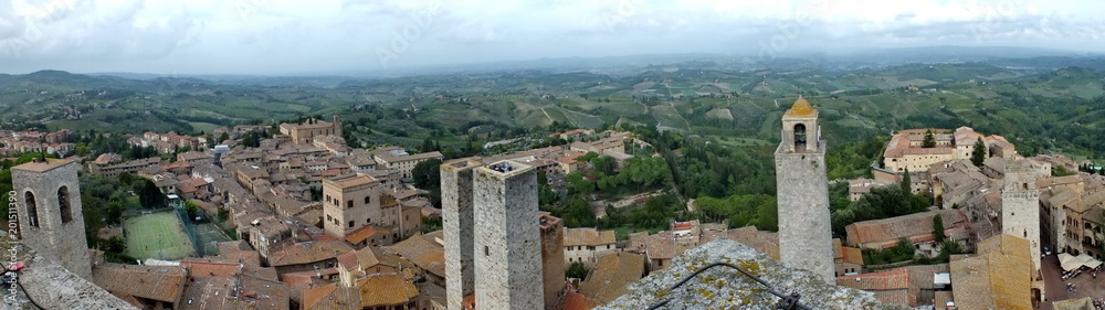 Panoramic view of medieval towers and terracotta rooftops in iconic San Gimignano, Tuscany, Italy