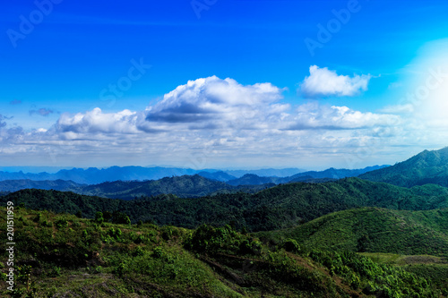 Beautiful landscape and many mountains. Surrounded vast forests with sunlight by the side.