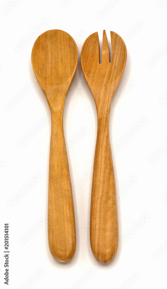 natural wooden spoon, fork (couple) isolated on white background for scooping the food, eating or mix herbles. It put in the kitchen natural wooden spoon, fork (couple) isolated on white background for scooping the food, eating or mix herbles. It put in the kitchen