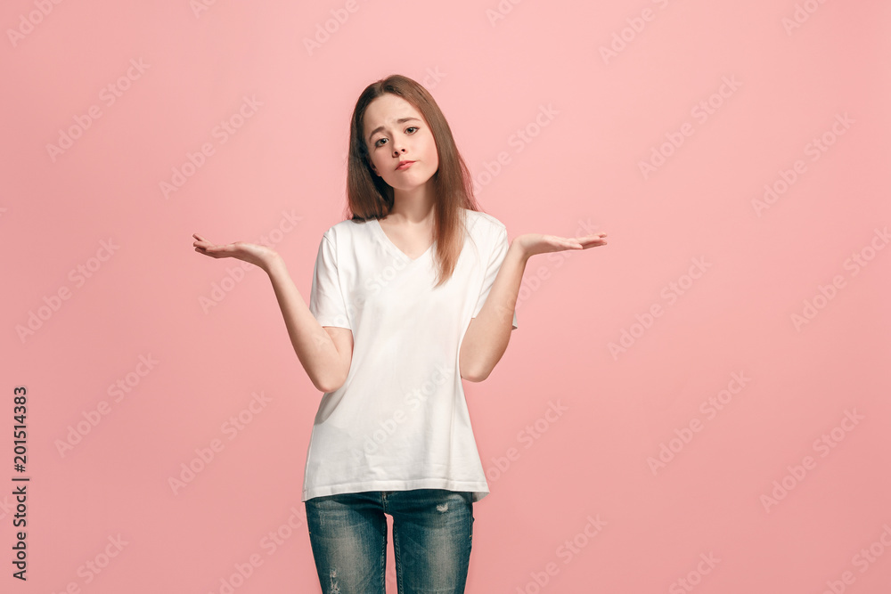 Beautiful teen girl looking suprised and bewildered Beautiful teen girl looking suprised and bewildered
