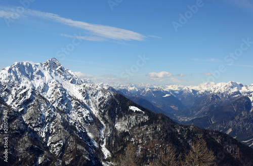 panoramic view of Mountain range with snow from Lussari Mount in