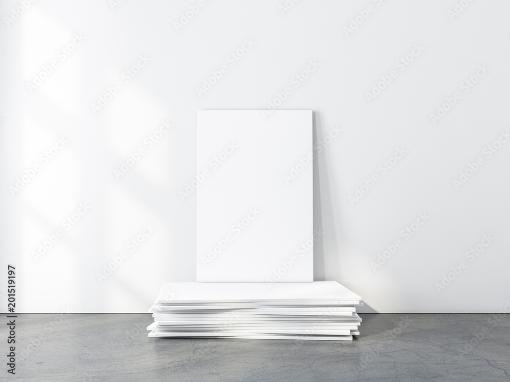 White Canvas Mockup standing on pack of frames in empty room. 3d rendering White Canvas Mockup standing on pack of frames in empty room. 3d rendering