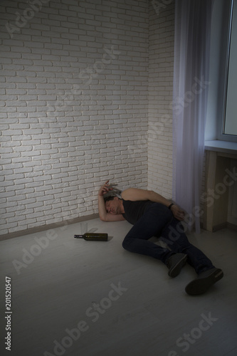 drunk man lies floor © sharpner