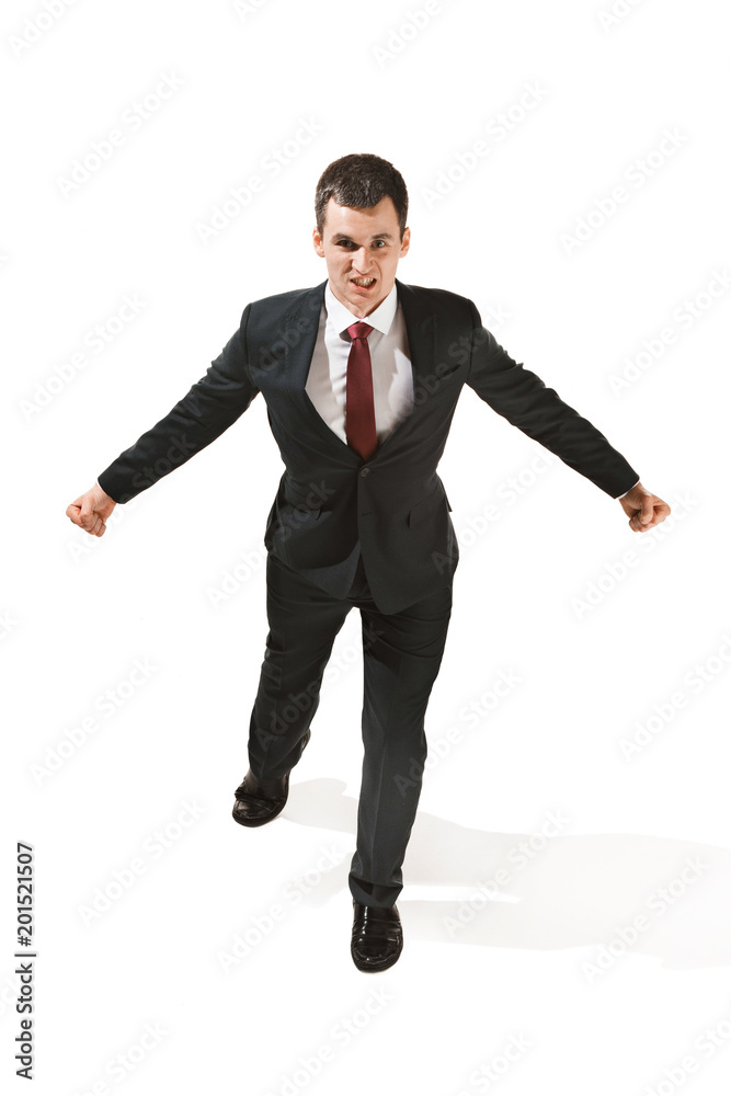 Above front portrait of a businessman with very serious face. Confident professional jumping in the foreground of the camera. Above front portrait of a businessman with very serious face. Confident professional jumping in the foreground of the camera.