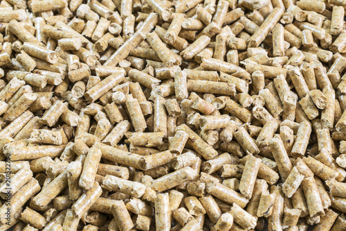 Solid Wood Pellets Background. Pressed Pellet made of Wood. Ecology and Heating season