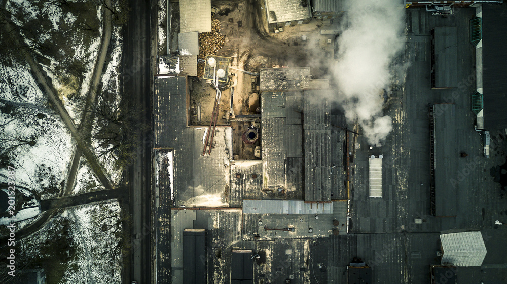 Aerial view from drone on the industrial factory. Smoke from pipeline. Aerial view from drone on the industrial factory. Smoke from pipeline.