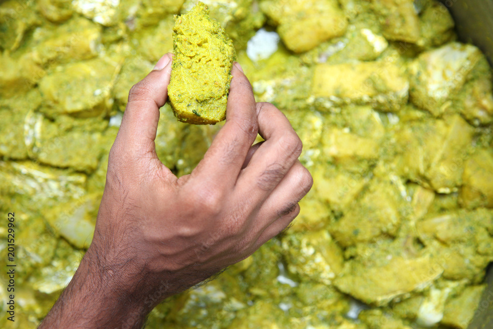 Deep Frying raw fish in the pan in india