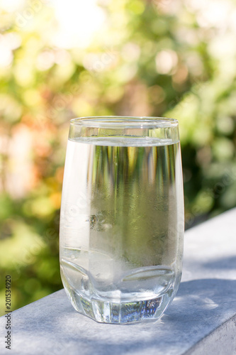 a glass of cold water on nature background for Refreshing