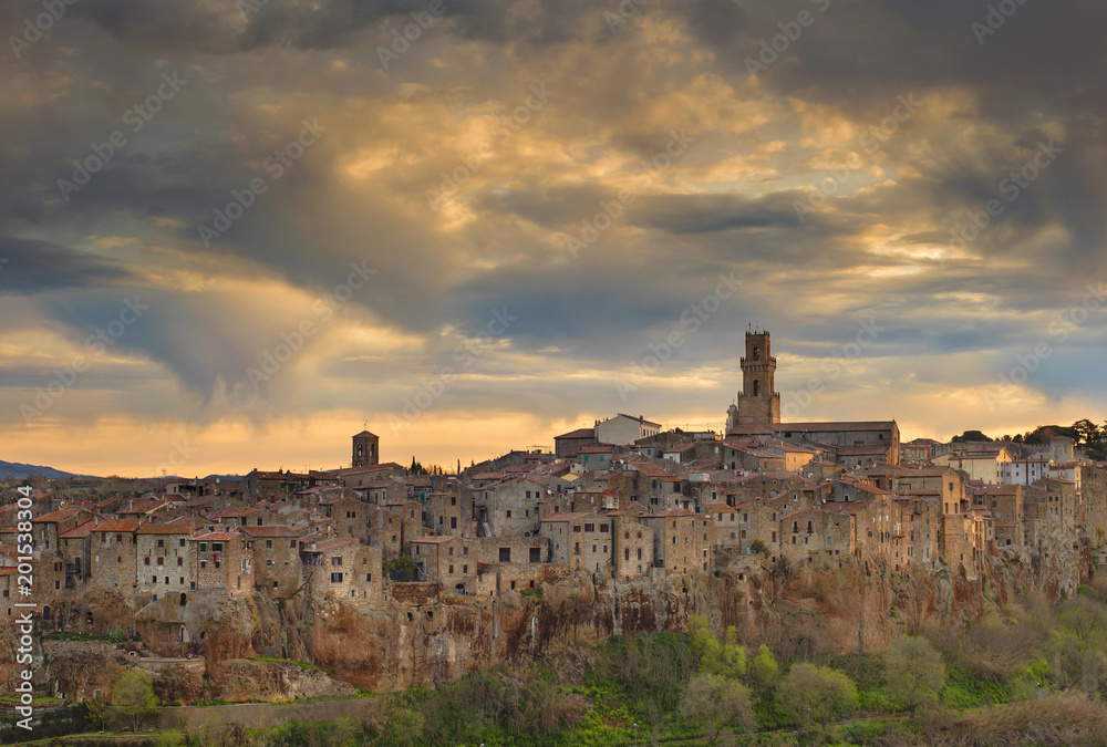 Beautiful evening sky above old city in Tuscany in Italy