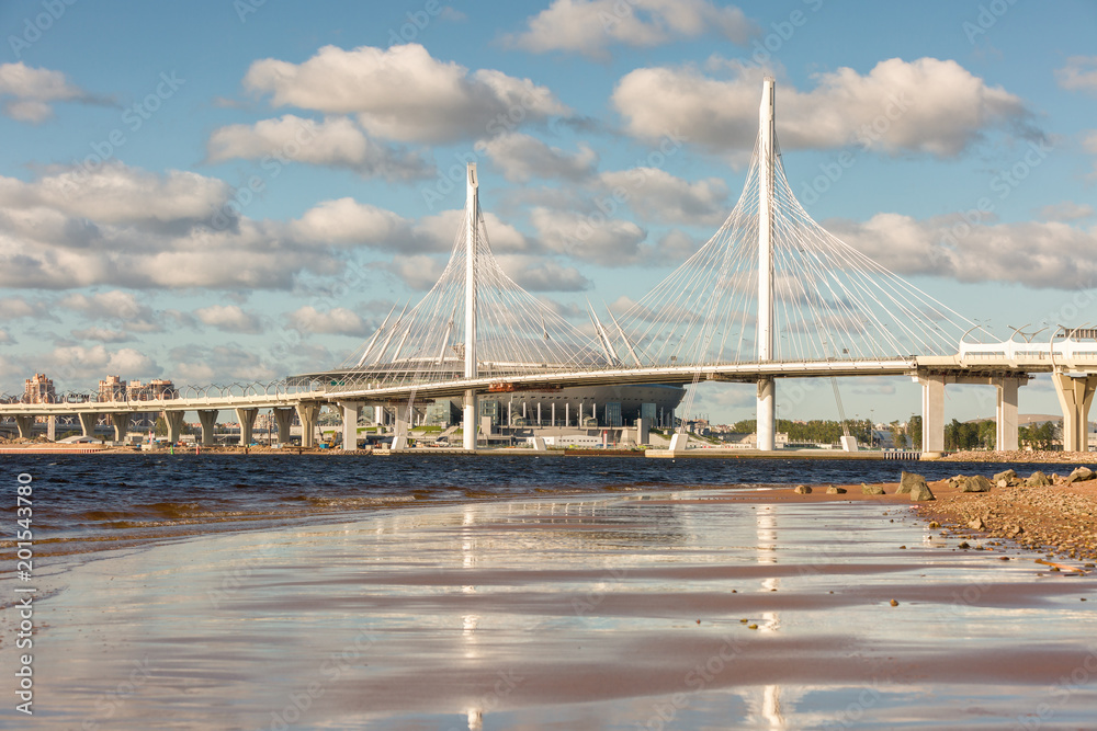 Obraz premium New highway road with cable-stayed bridge over the Neva river in St.Petersburg