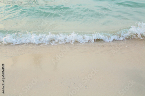 Small beautiful waves of the sea. Sea shore. Background.