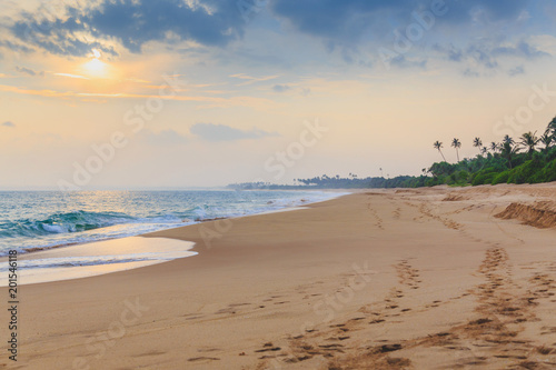 fabulous sunset on beautiful tropical beach