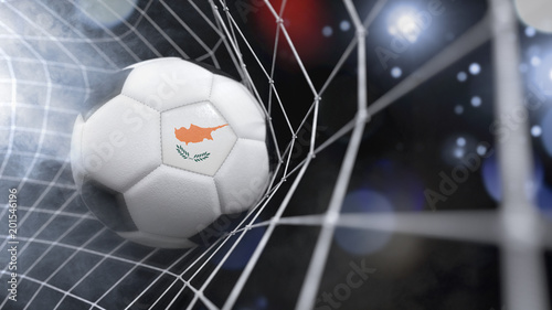 Realistic soccer ball in the net with the flag of Cyprus.(series) photo