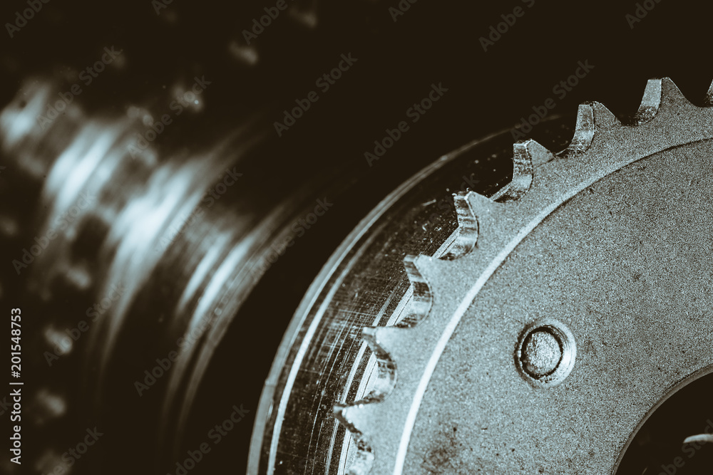 Monochrome background image of gear close up. Artwork from auto part in macro photography. Monochrome background image of gear close up. Artwork from auto part in macro photography.