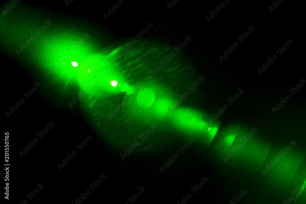 Camera lens flare by laser light create hexagons of objective iris