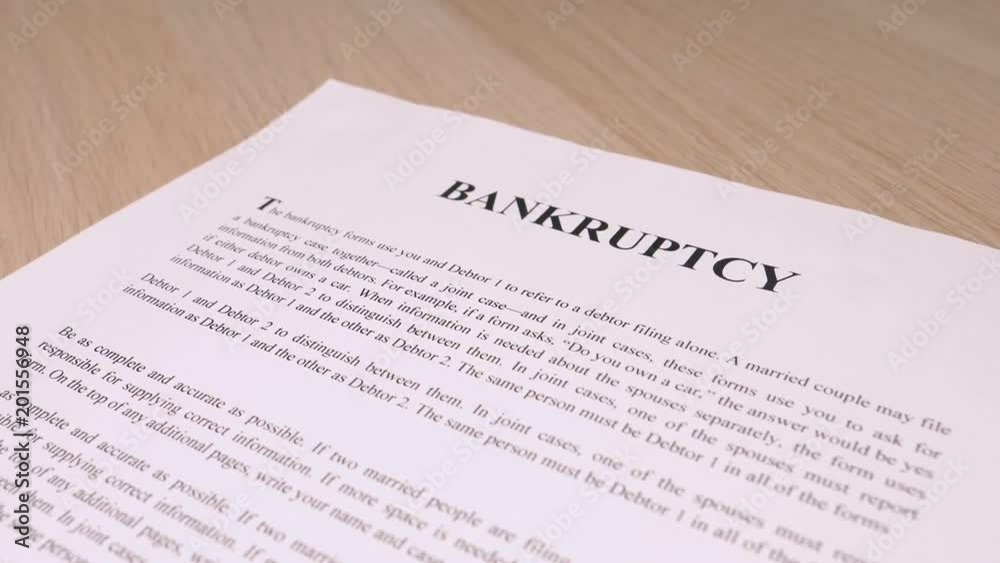 Camera turning around a bankruptcy statement document