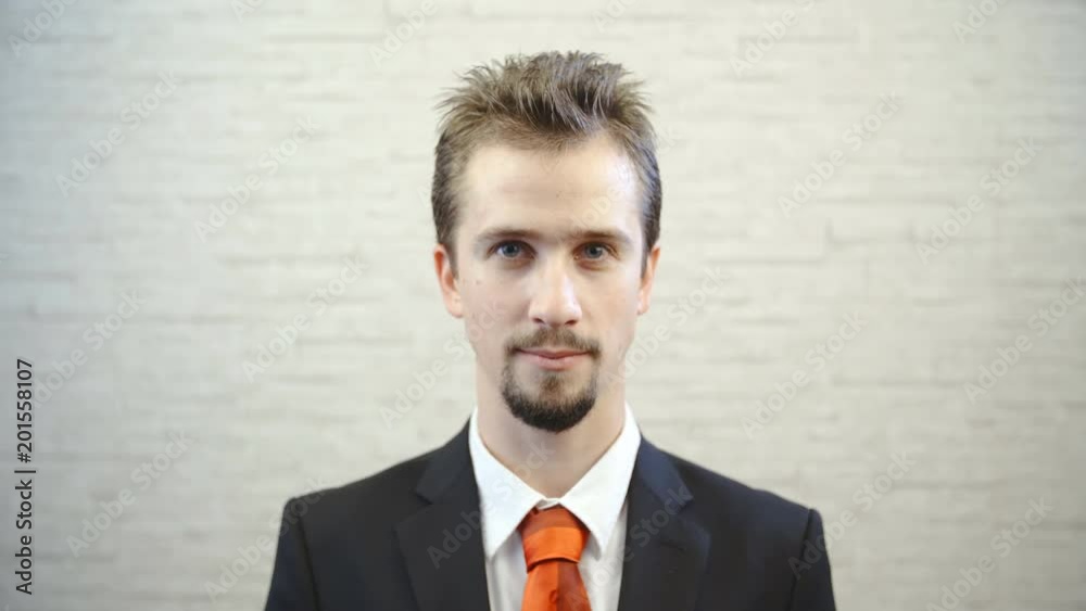 Young successful businessman portrait looking in to camera 4K Young successful businessman portrait looking in to camera 4K