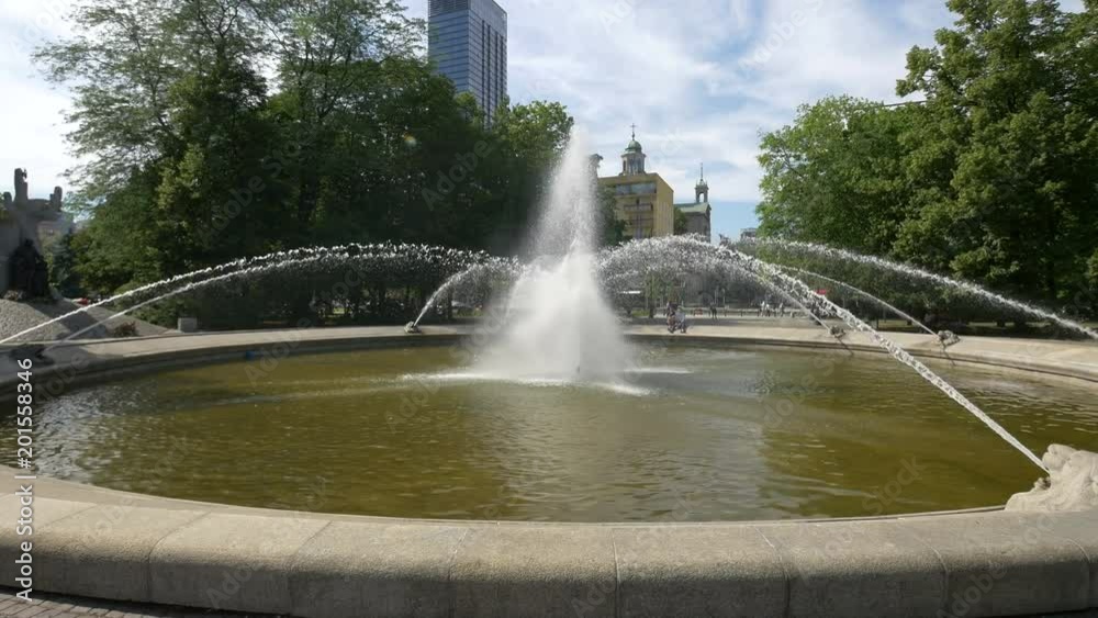 Springing fountain in a park Springing fountain in a park