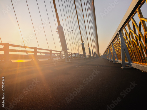 On the Bridge in the morning with a orange light