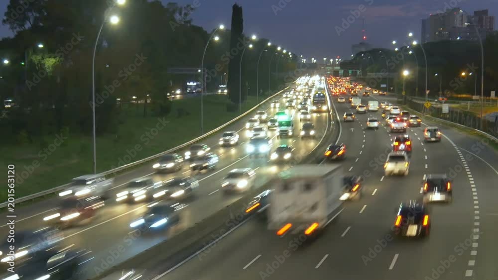 Time lapse / Hyper Lapse over highway traffic – jam. Dusk, Magic Hour, night. Time lapse / Hyper Lapse over highway traffic – jam. Dusk, Magic Hour, night.
