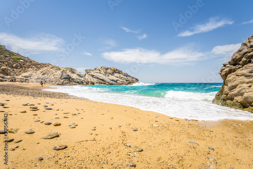 Beautiful sunny cozy holiday bay with big waves with crystal clear blue water sandy beach and a small laguna for sunbathing swimming or surfing, Ikaria Island, Nas Beach, Samos, Sporades, Greece © Thomas Jastram