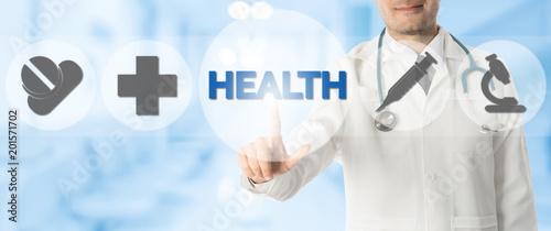 Doctor Points at HEALTH with Medical Icons photo