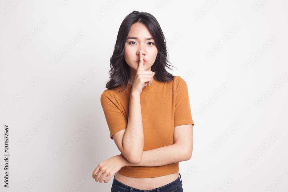 Obraz premium Asian girl smile show quite hand sign.